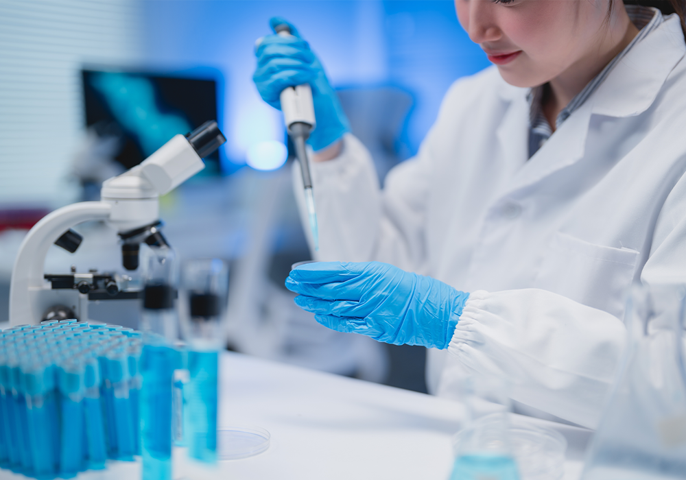 a medical researcher tests genetic material