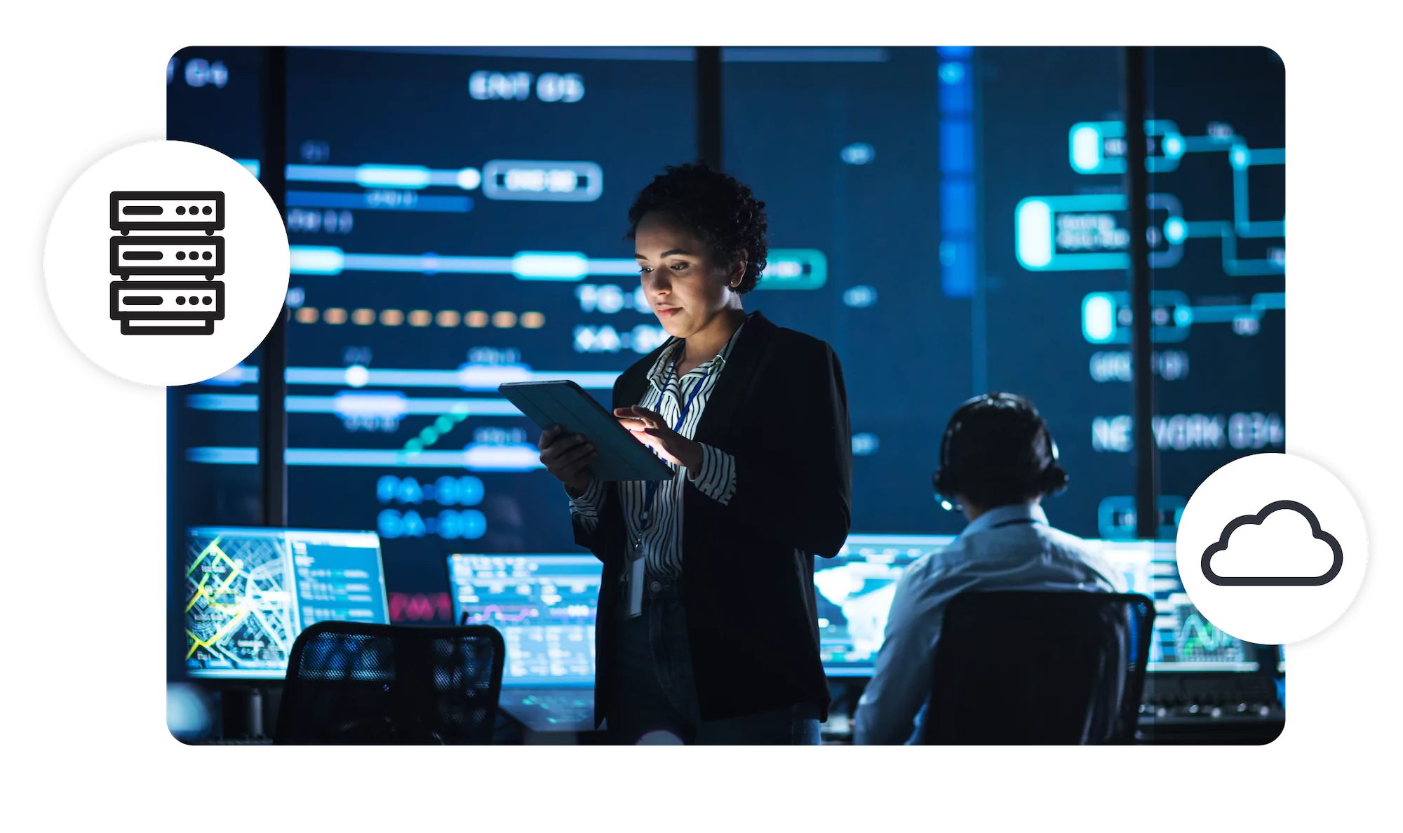 Woman in a data center, looking at a tablet