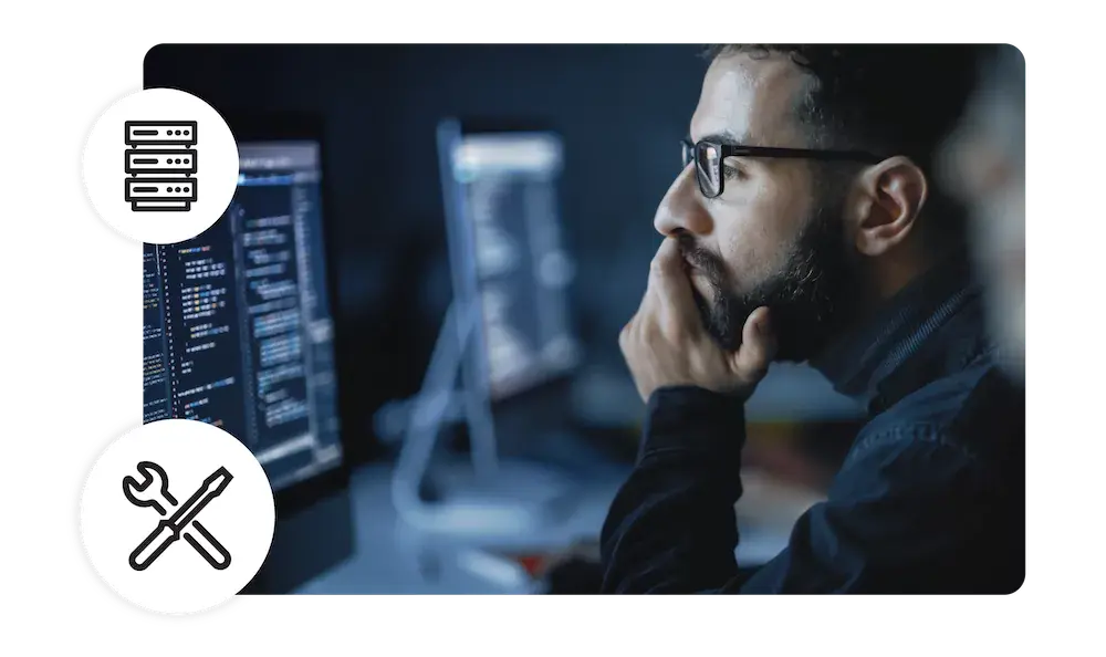 A man viewing code on a computer