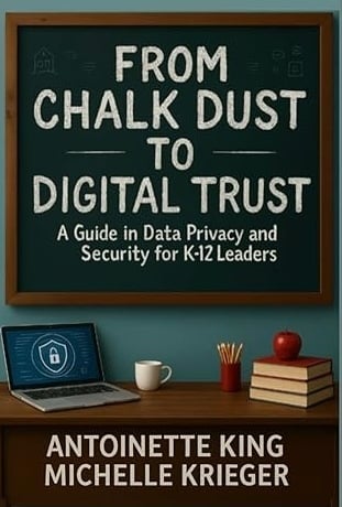 "From Chalk Dust to Digital Trust: A guide in Data Privacy and Security for K-12 Leaders" book cover: a walnut desk with a laptop on the left, a coffee mug, and a stack of books sits below a chalk board with the book title on it.