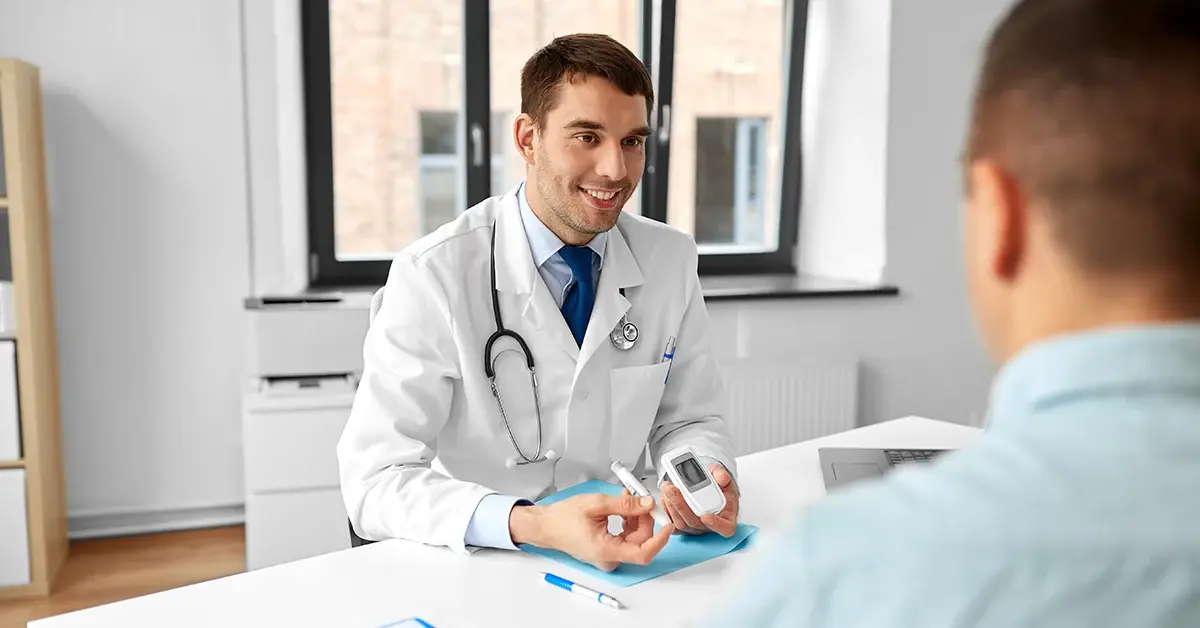 a doctor meets with a diabetes patient