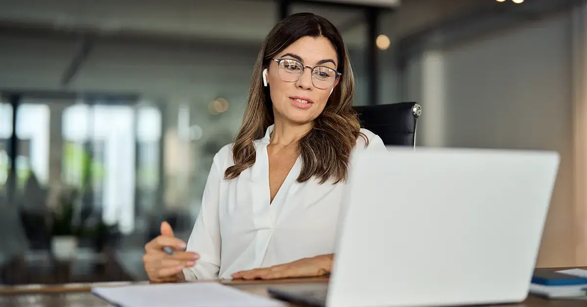 financial professional works at her laptop
