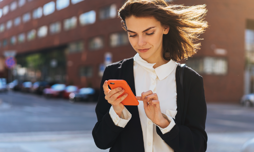 woman-using-orange-phone-01