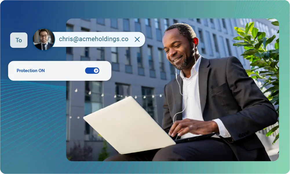 A man in a suit works on a laptop outdoors. Icons show Virtru data protection is on.